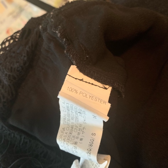 Black Romper with lace meshing at the back and draw string in the waist. - Picture 8 of 9